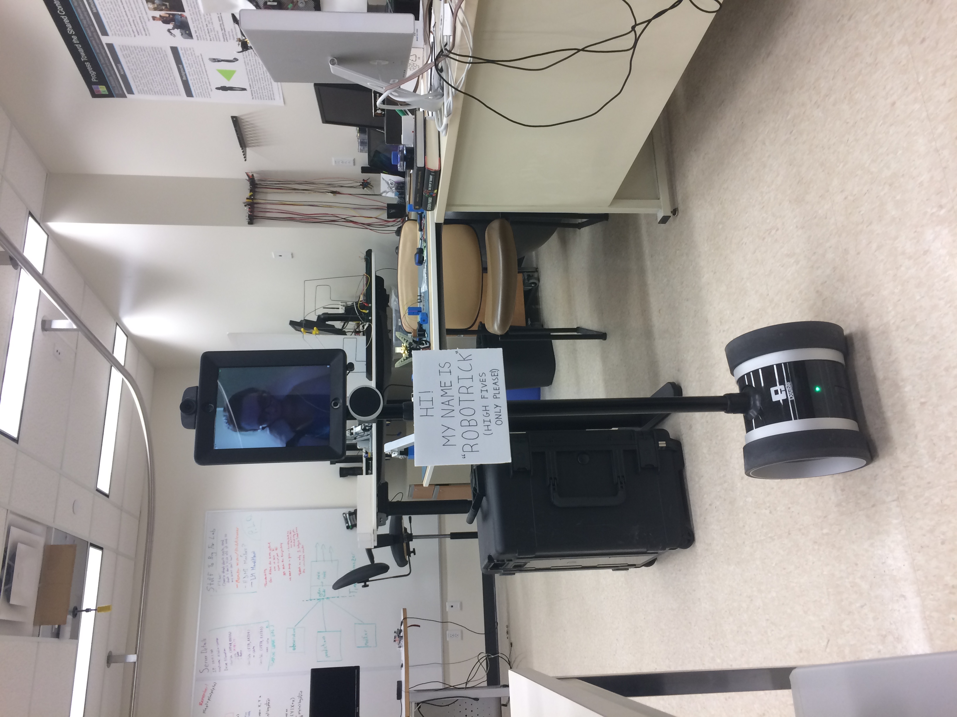 The lab telepresence robot is actually being used, and it's kind of weird. The robot sways to give a life-like sense...