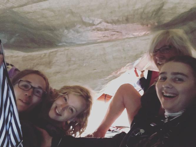 Family festival tarp burrito to keep out of the torrential rain for the @edmfolkfest. We managed to stick it out...