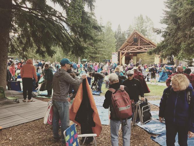 Recovering from DLRL summer school by scrambling for tarp space at the Canmore Folk Fest 🎻 🎶