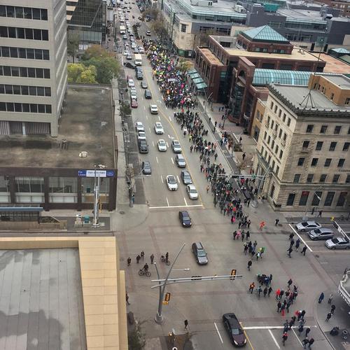 The #climatestrike in #yeg making its way down jasper ave. #weekforfuture
